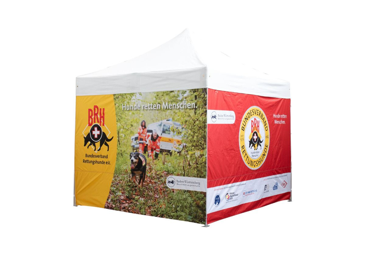Duratent Faltzelt Hexa50 mit individuell bedruckten Seitenteilen, präsentiert vom Bundesverband Rettungshunde e.V. Das wetterfeste Faltpavillon bietet optimalen Schutz und Werbefläche für Organisationen und Events. Robustes Faltzelt für vielseitige Outdoor-Einsätze.